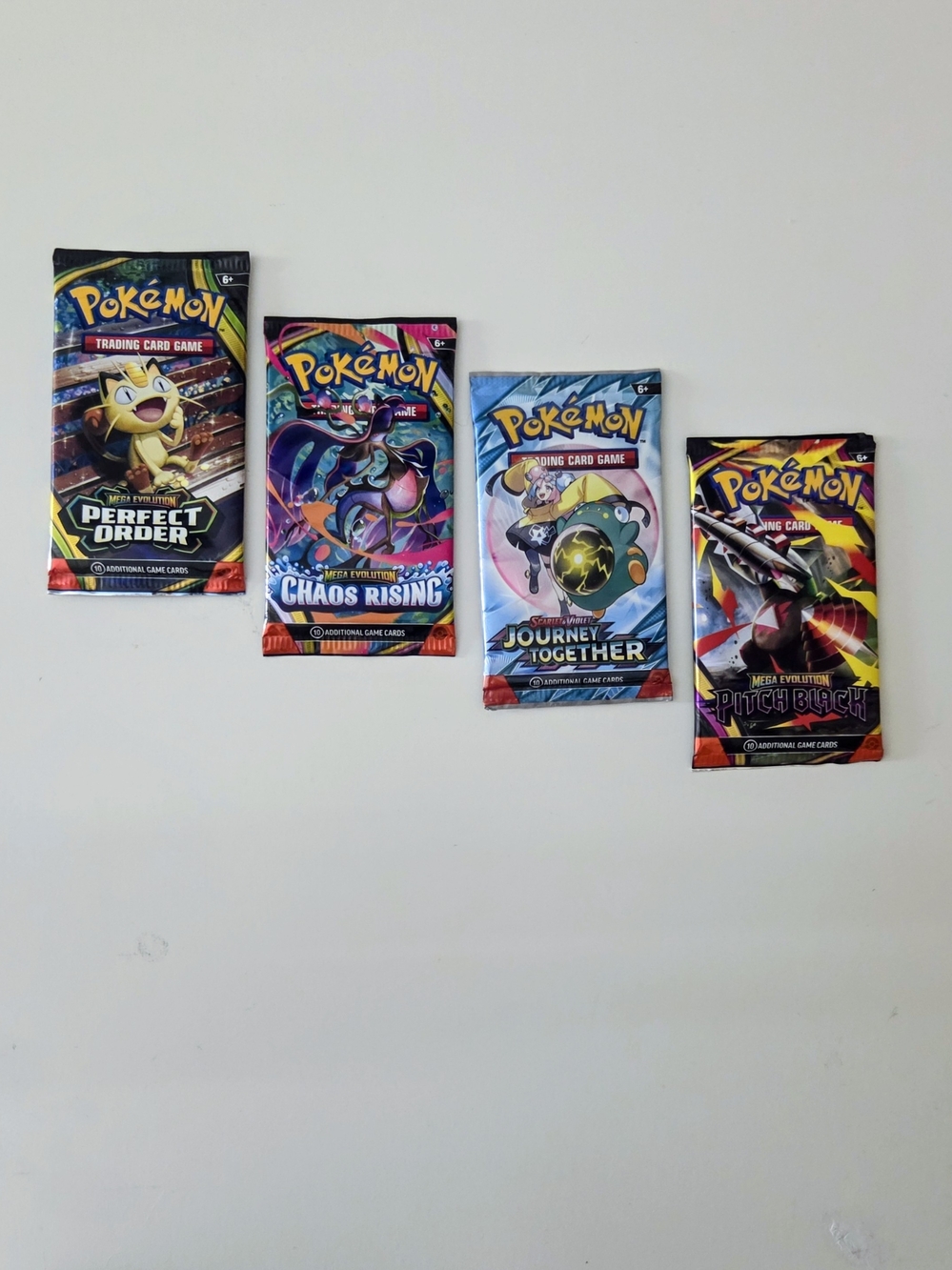 Pokémon TCG Pitch Black, Chaos Rising, Perfect Order & Journey Together